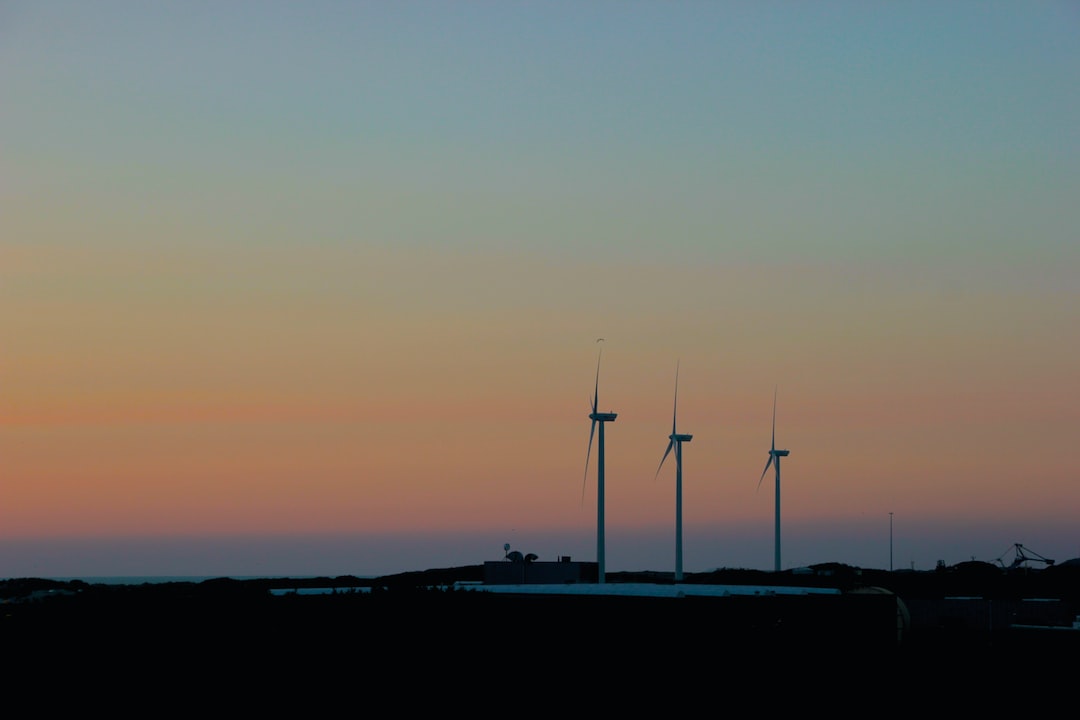 silhouette of wind turbines