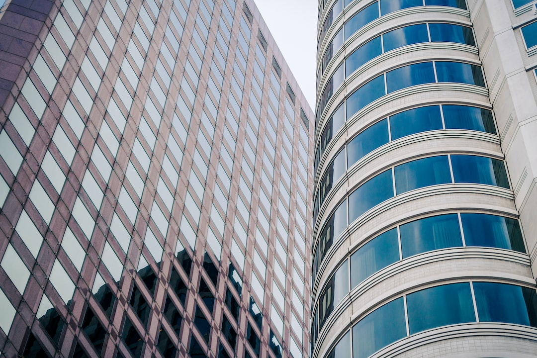 low-angle photography of high rise buildings