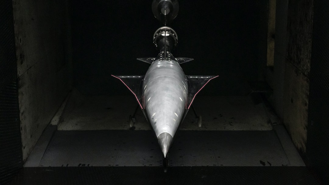 an airplane is shown in a dark room