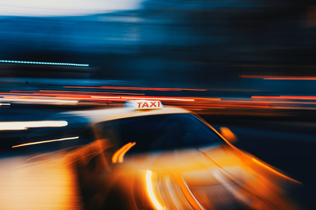 timelapse photography of orange vehicle