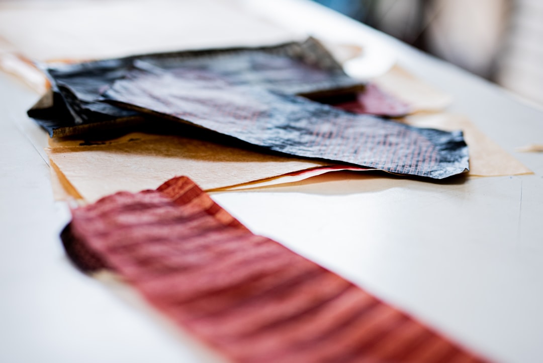 red and black striped textile