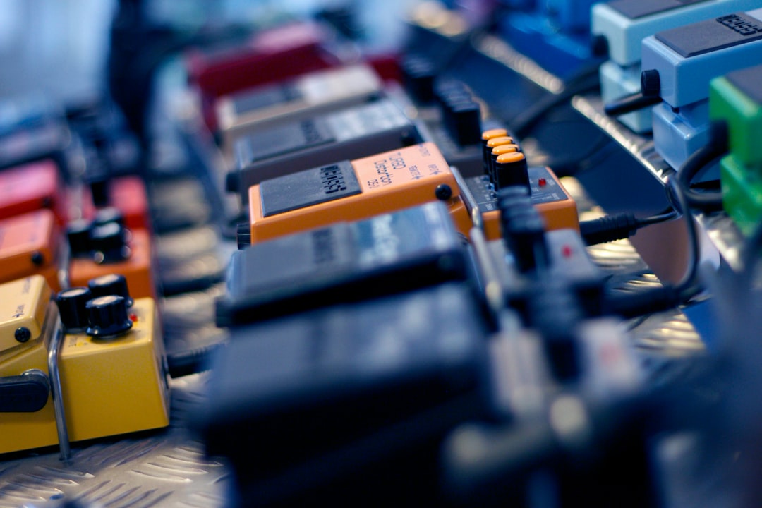 selective focus photo of guitar pedals