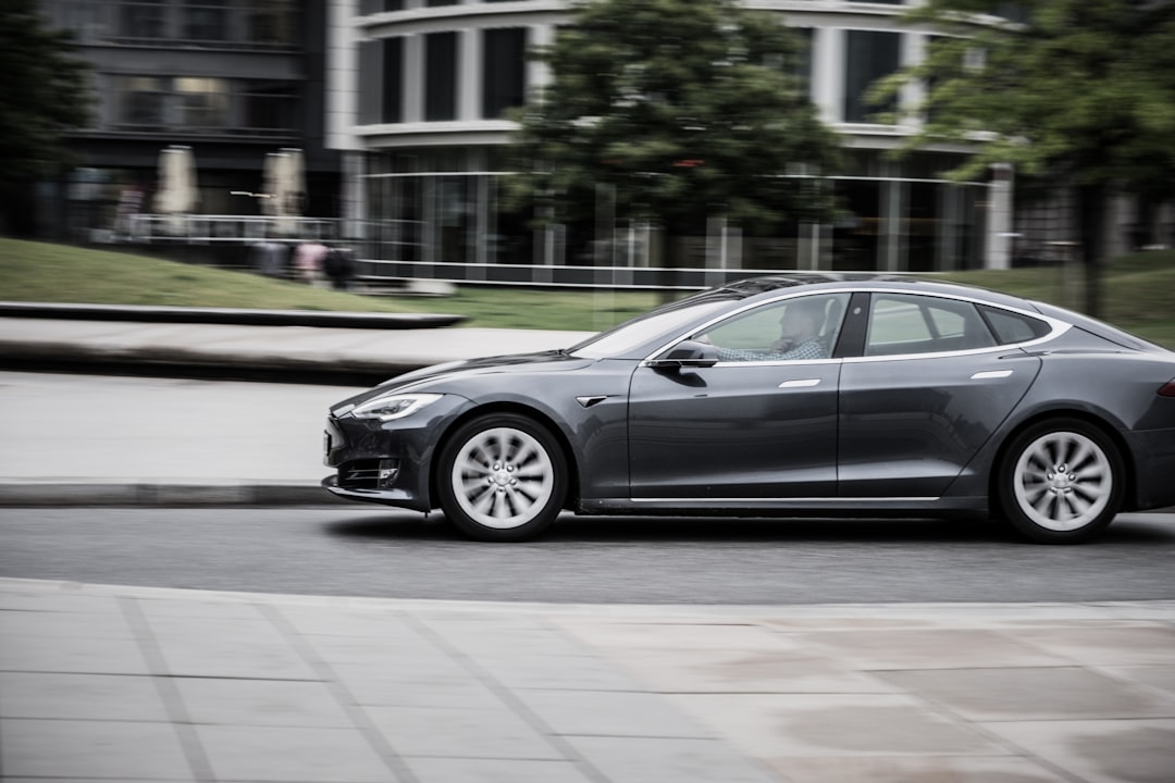 panning photography of sedan