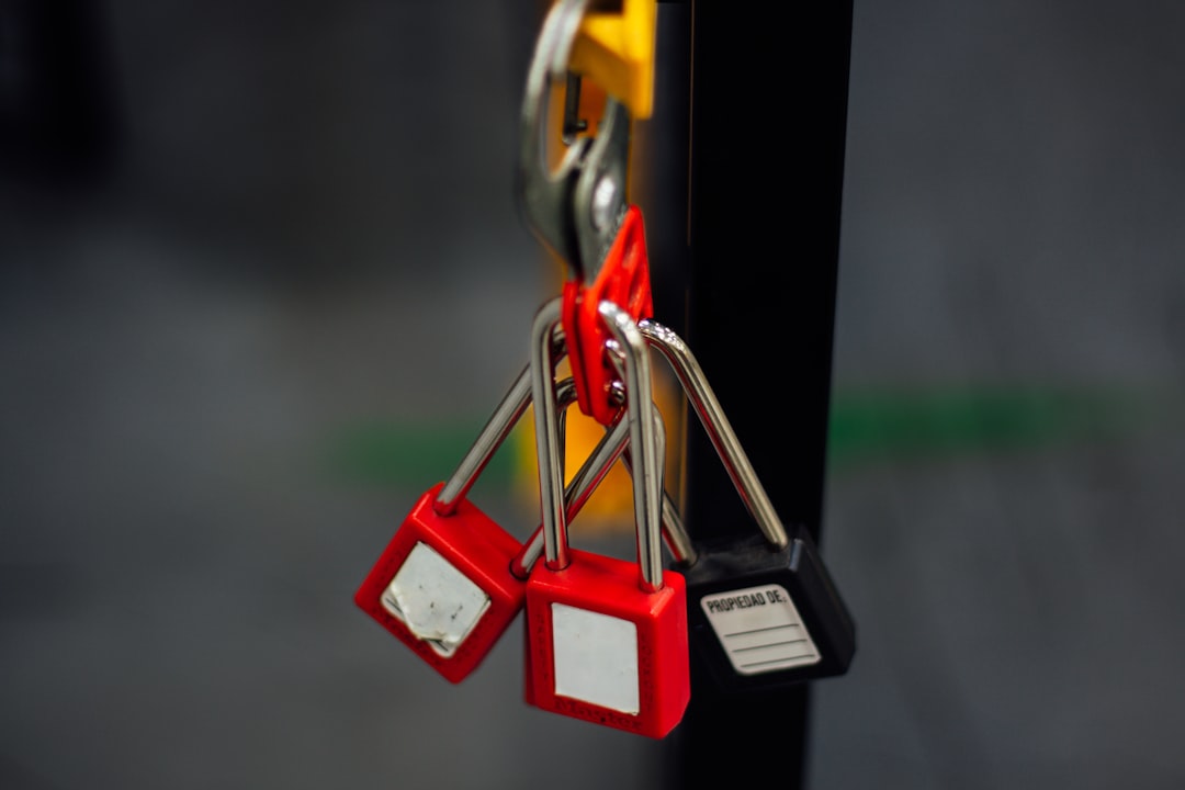 a close up of a bunch of keys hanging from a hook