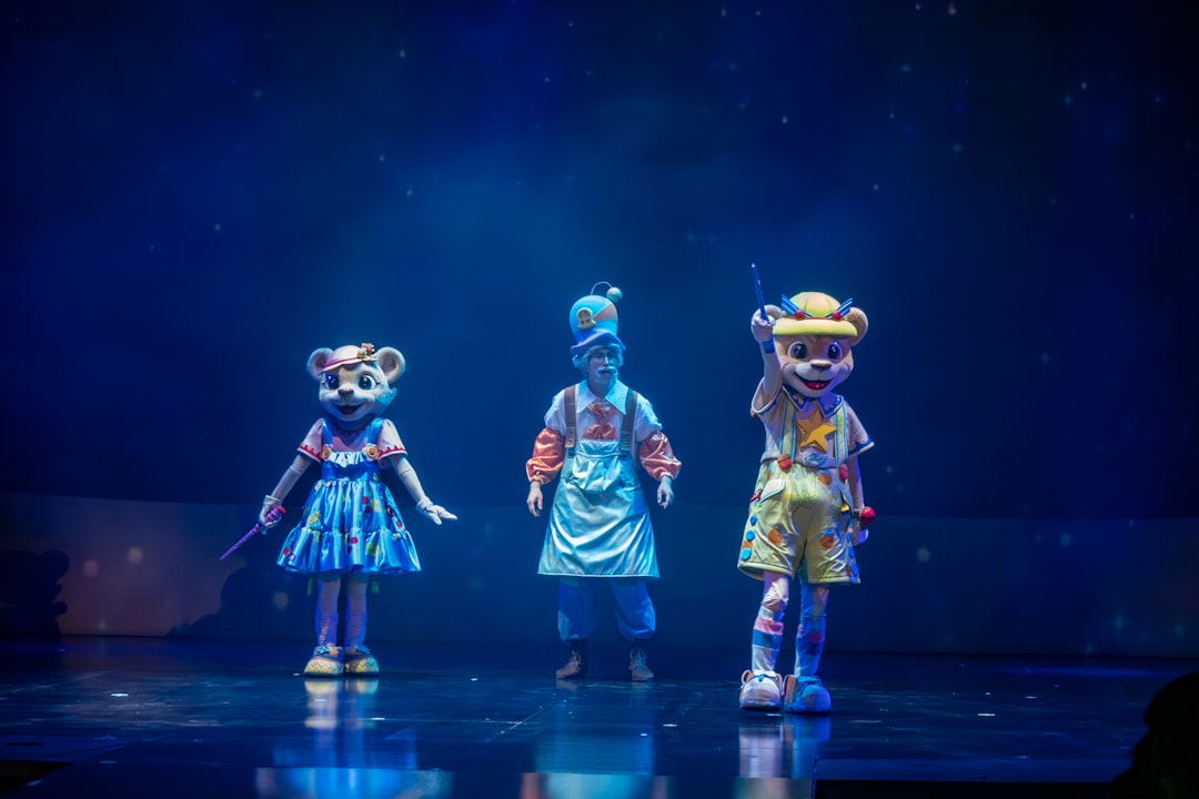 a group of people standing on top of a stage