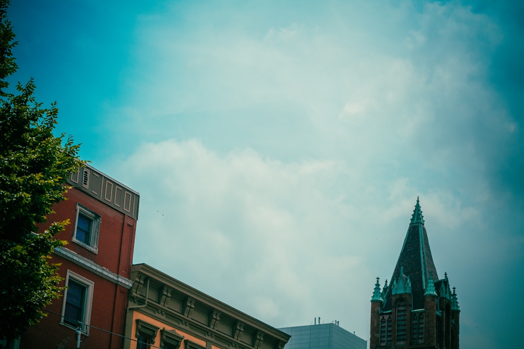 a tall building with a steeple on top of it