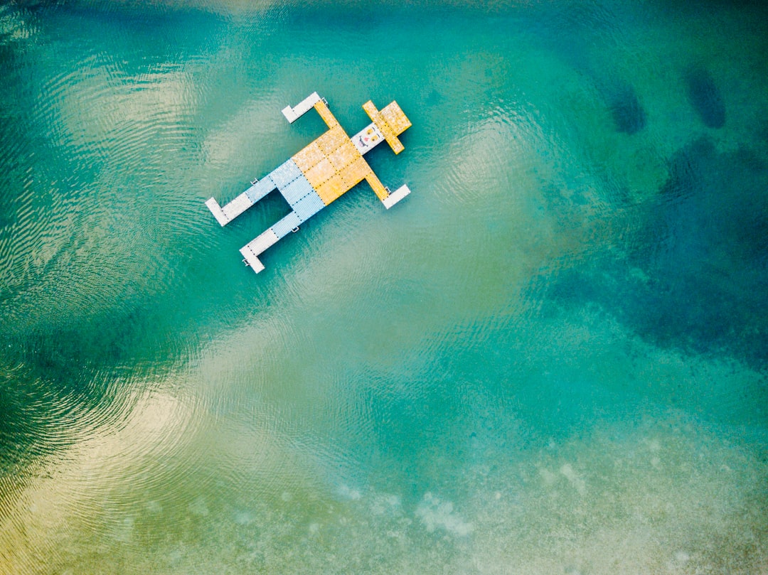 wooden toy floating on body of water