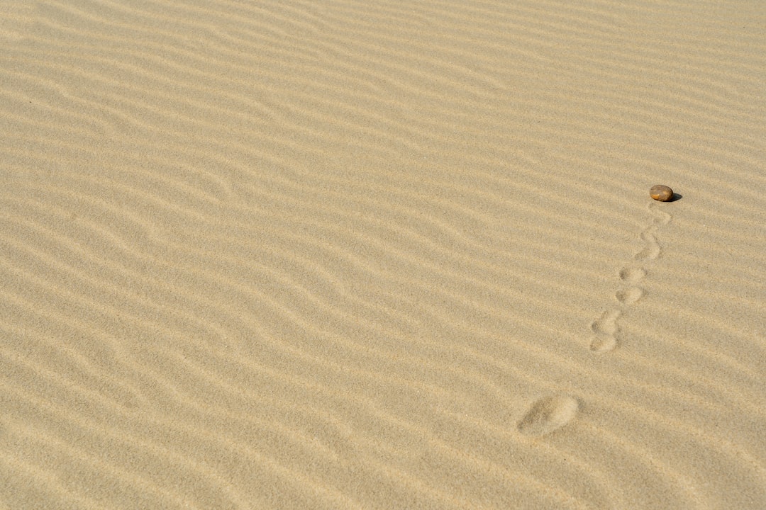 white sand with water droplets