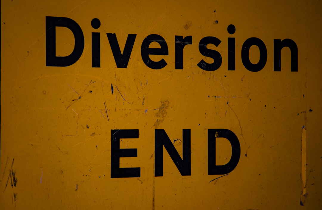 A yellow sign that says diversion end