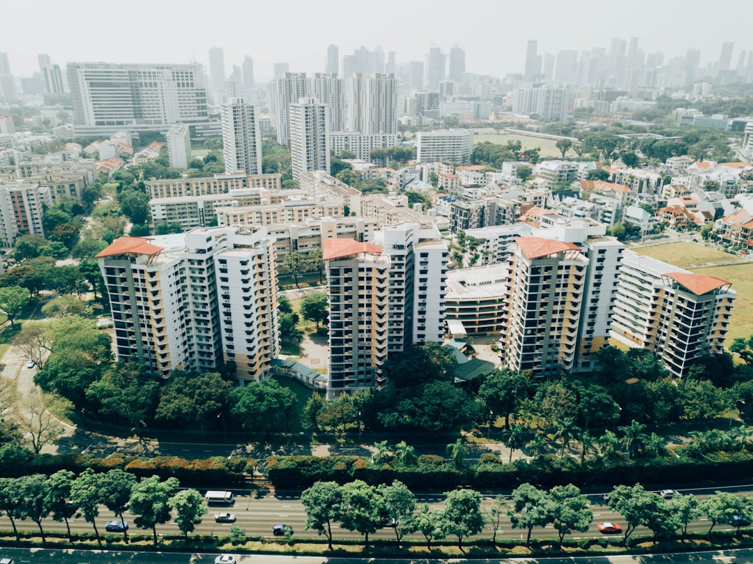 white and orange concrete buildings aerial photography