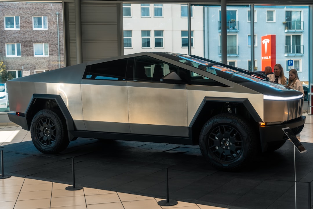 A futuristic car is on display in a building