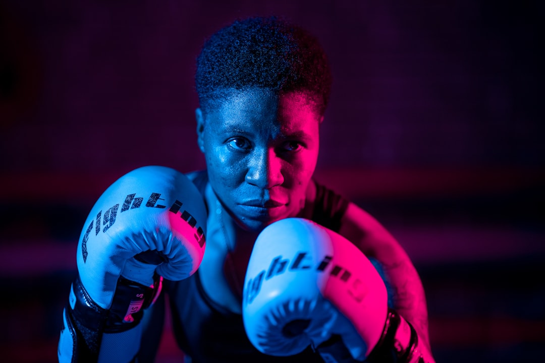 man in red and white boxing gloves